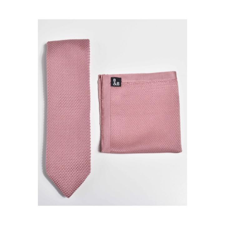 Antique rose knitted tie and pocket square set displayed elegantly, showcasing the intricate knit pattern and rich color.