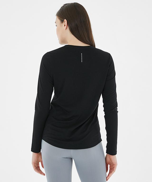 A stylish Anytime Long Sleeve shirt featuring a relaxed fit, diagonal waistline, and reflective tape details.