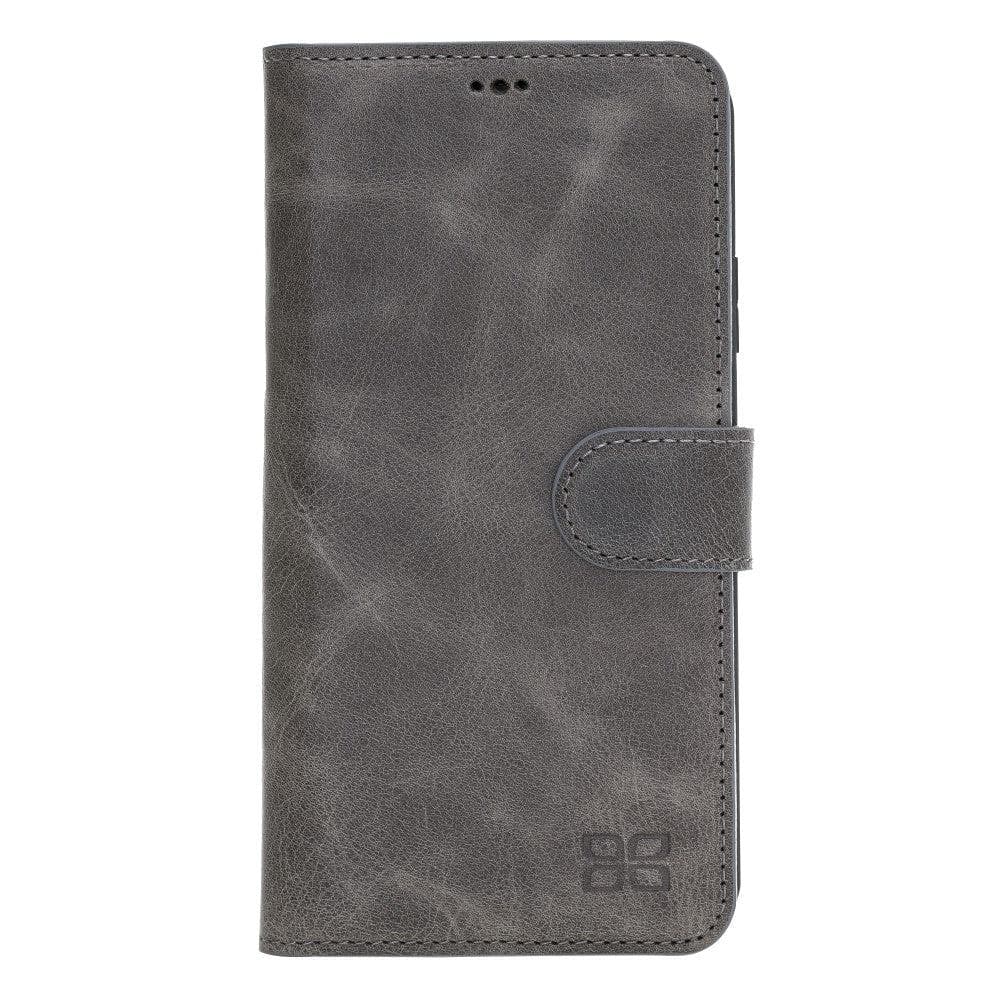 Apple iPhone 11 Series Detachable Leather Wallet Case in black, showcasing its sleek design and card slots.