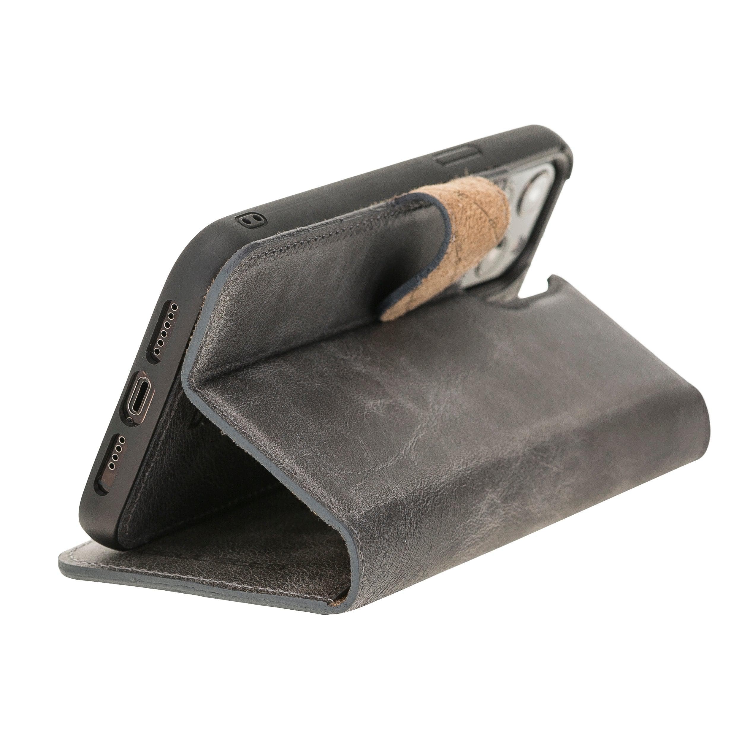 Bouletta iPhone 12 Series Detachable Leather Wallet Case in black, showcasing card slots and banknotes compartment.