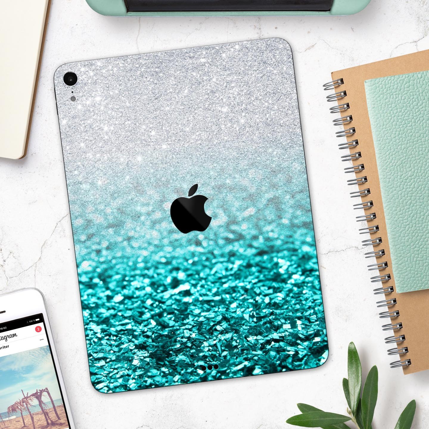 Aqua Blue and Silver Glimmer Fade full body skin decal for Apple devices, showcasing vibrant colors and a sleek design.