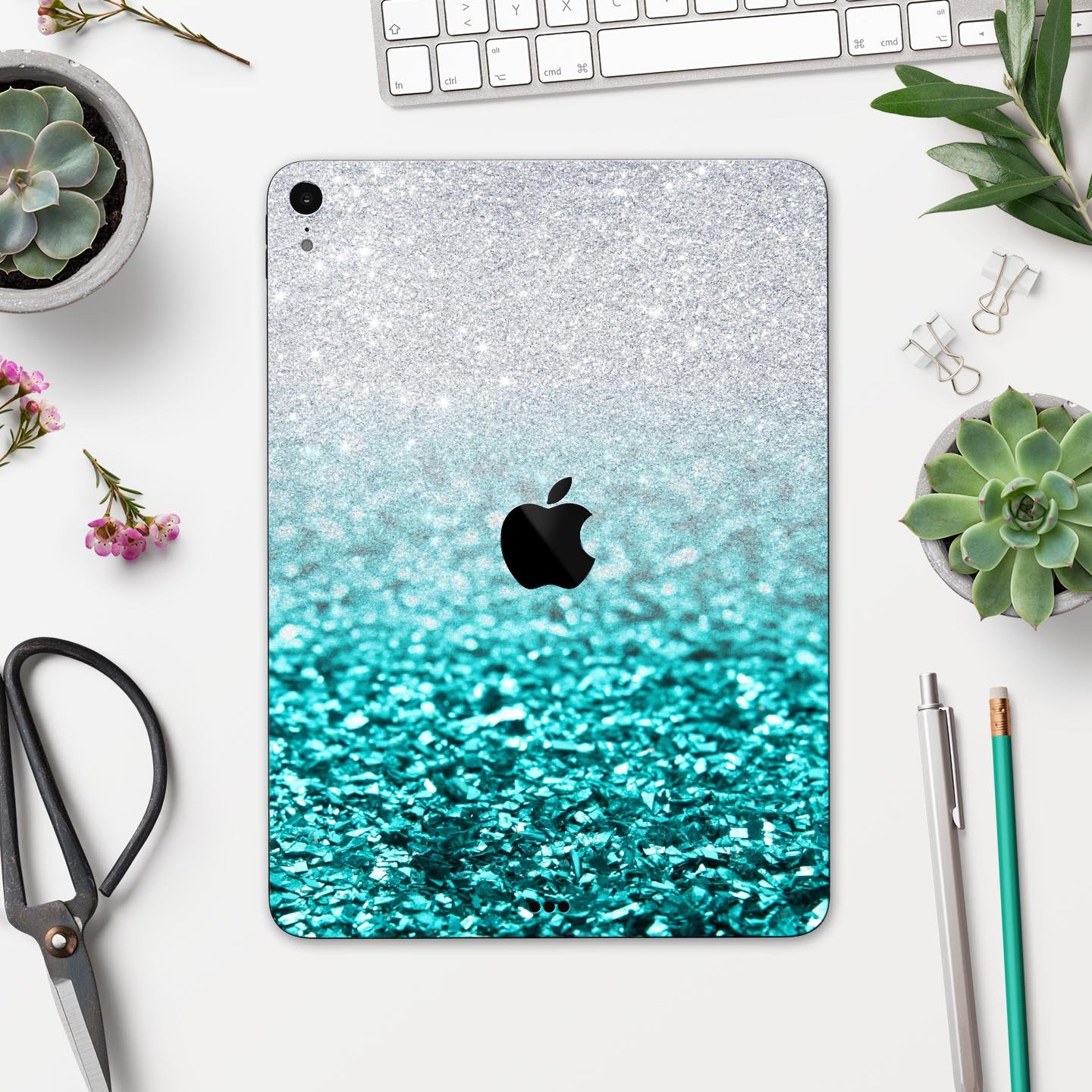 Aqua Blue and Silver Glimmer Fade full body skin decal for Apple devices, showcasing vibrant colors and a sleek design.