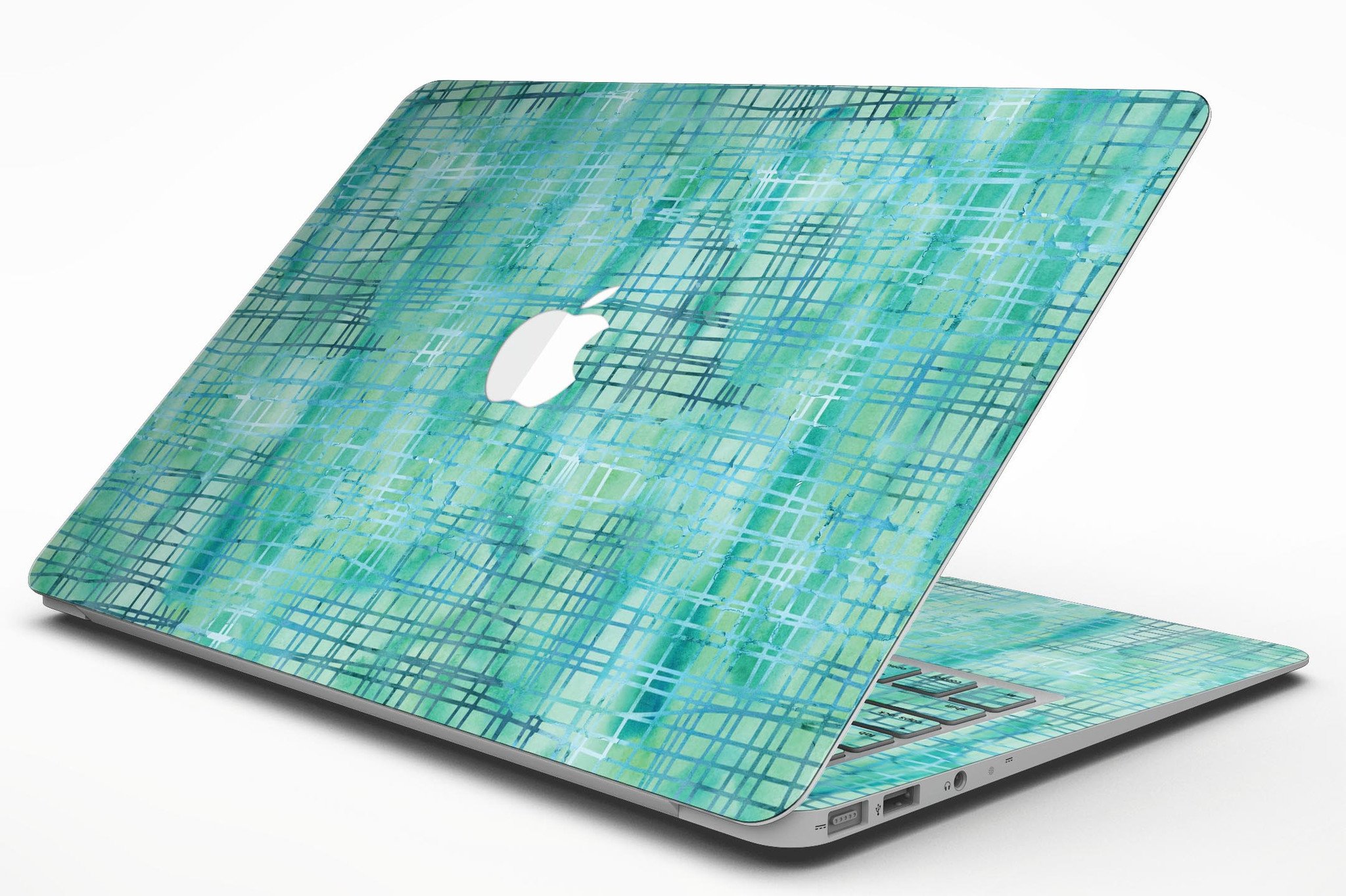 Aqua Watercolor Cross Hatch skin applied to a MacBook Air, showcasing vibrant colors and smooth finish.