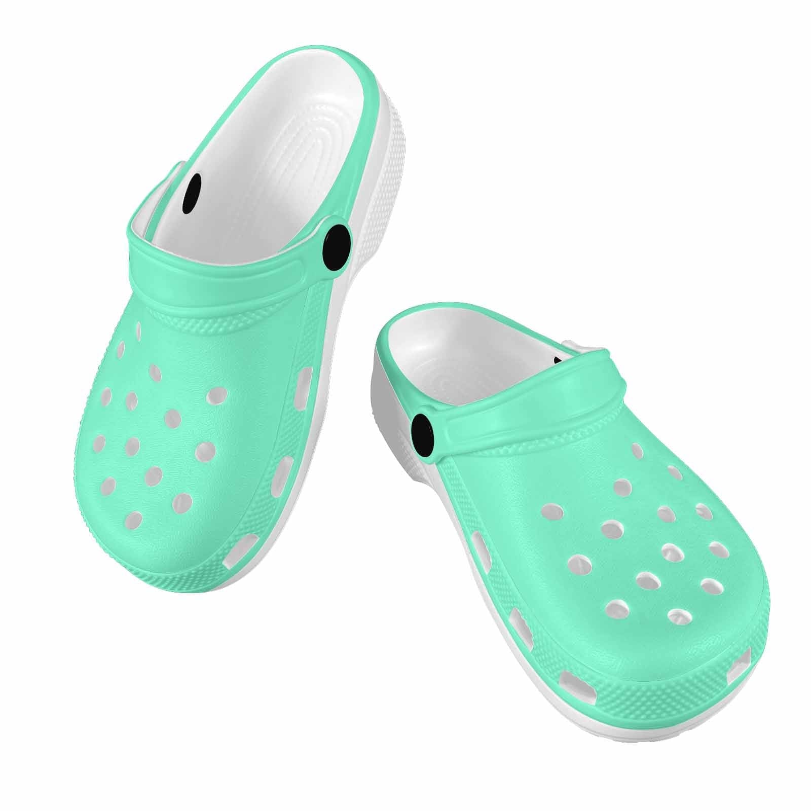 Aquamarine green clogs designed for youth, featuring a slip-on design, ventilation ports, and cushioned sole for comfort.