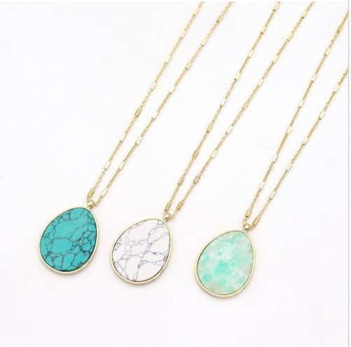 Arielle Stone Pendant Necklace featuring a 29-inch drop, showcasing a beautiful stone pendant in three available colors.