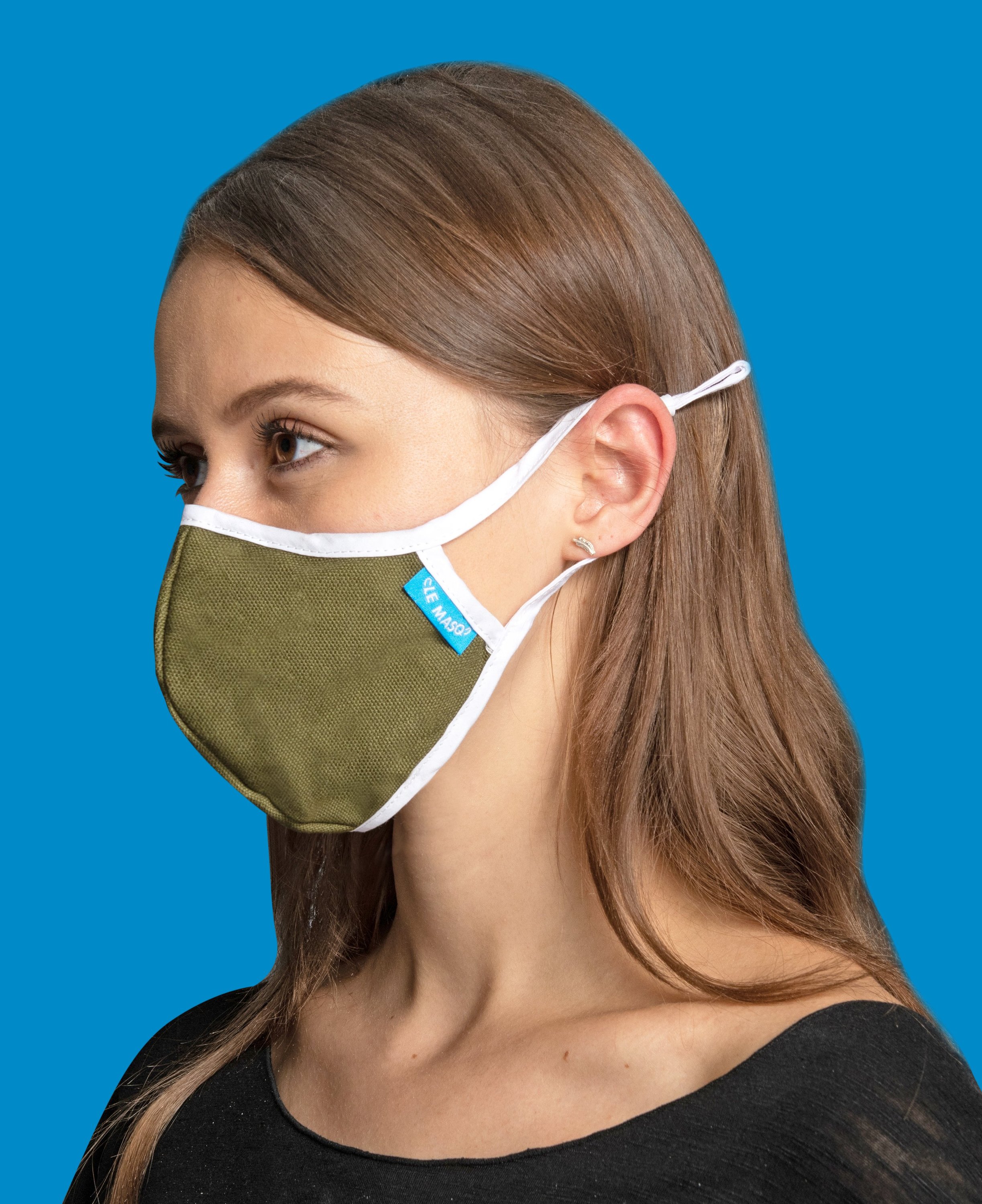 Army Green Canvas Mask featuring a breathable design with adjustable ear toggles and a removable inner layer for added comfort.