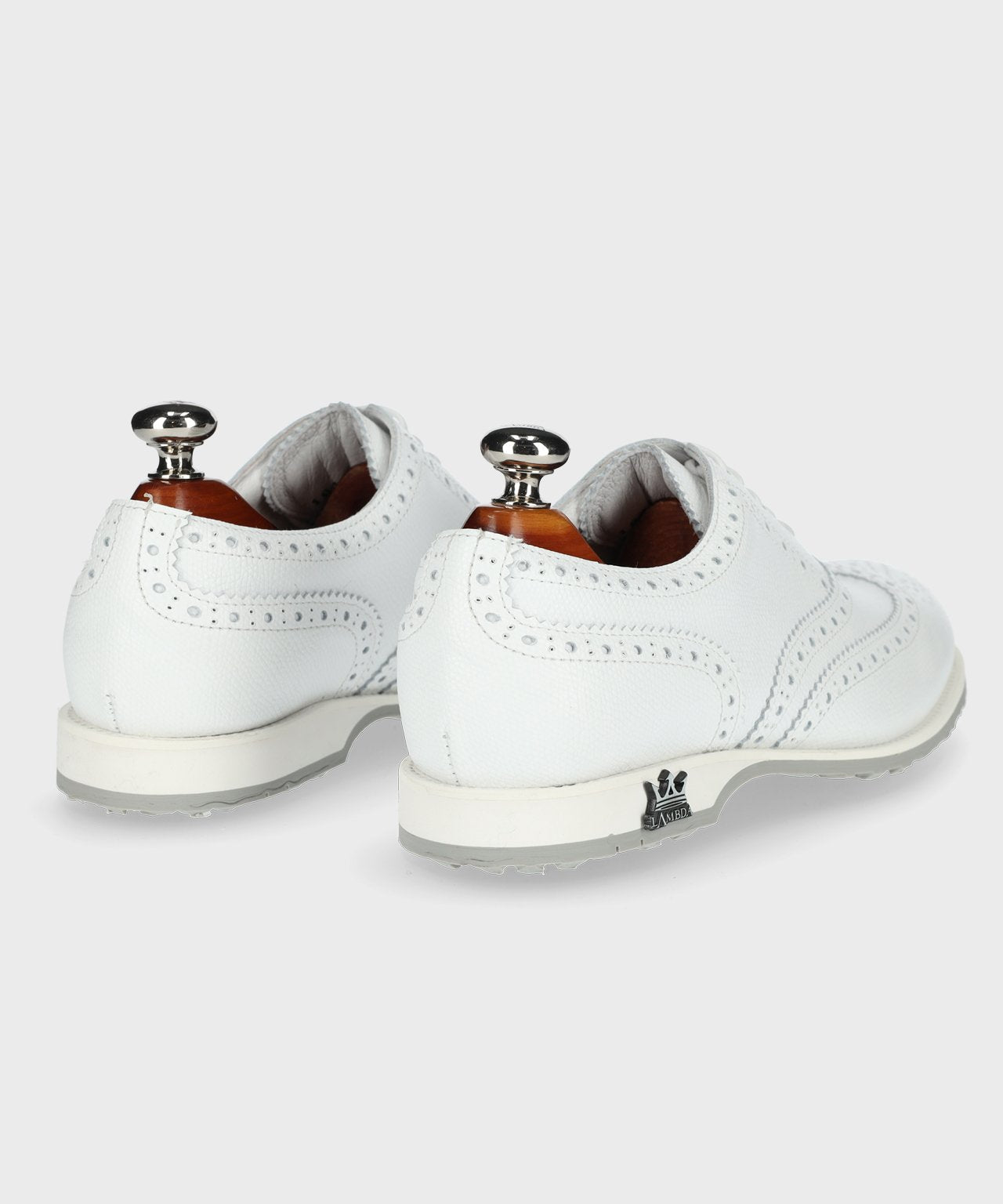 Asti White Ladies golf shoe showcasing premium waterproof leather and spikeless outsole design.