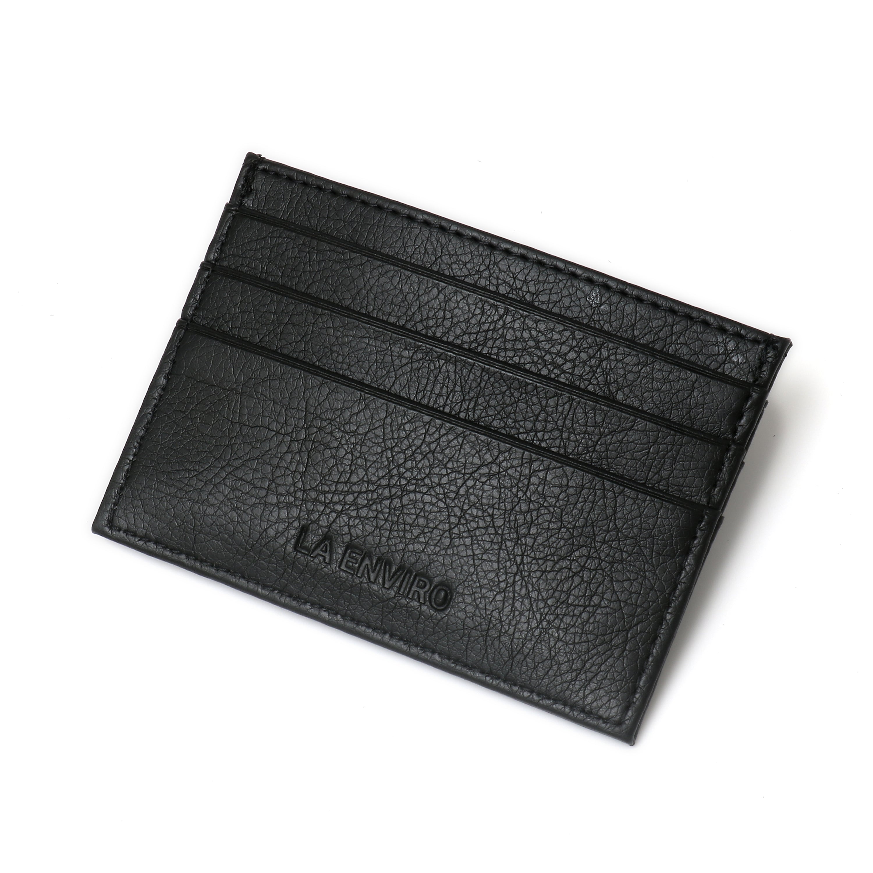 AVOCA Unisex Card Holder in Black, made from premium vegan leather, featuring multiple card pockets and a sleek design.