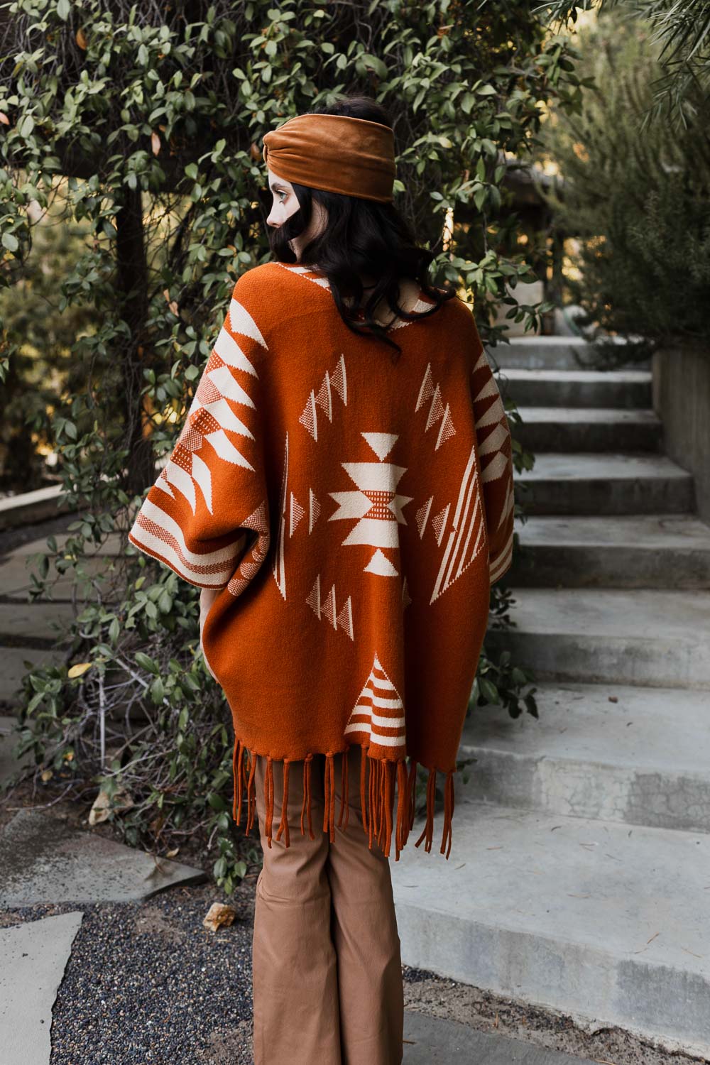 Aztec Luxe Fringed Ruana featuring stylish fringed trim and cozy fabric, perfect for fall and winter fashion.