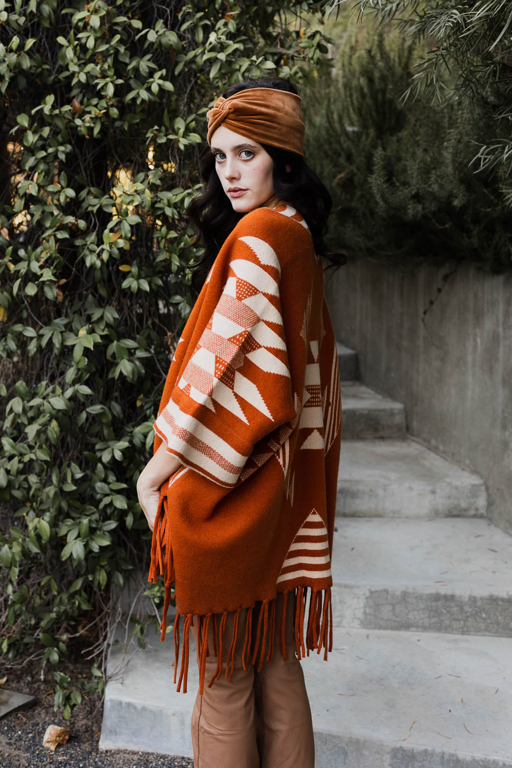 Aztec Luxe Fringed Ruana featuring stylish fringed trim and cozy fabric, perfect for fall and winter fashion.