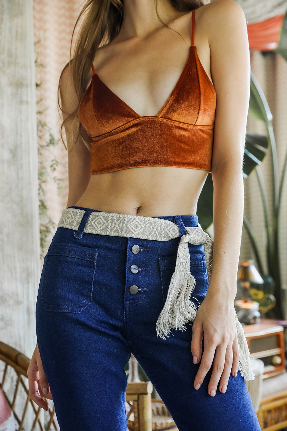 A stylish Aztec waist tie belt made of 100% cotton featuring a vibrant woven design, perfect for enhancing any outfit.