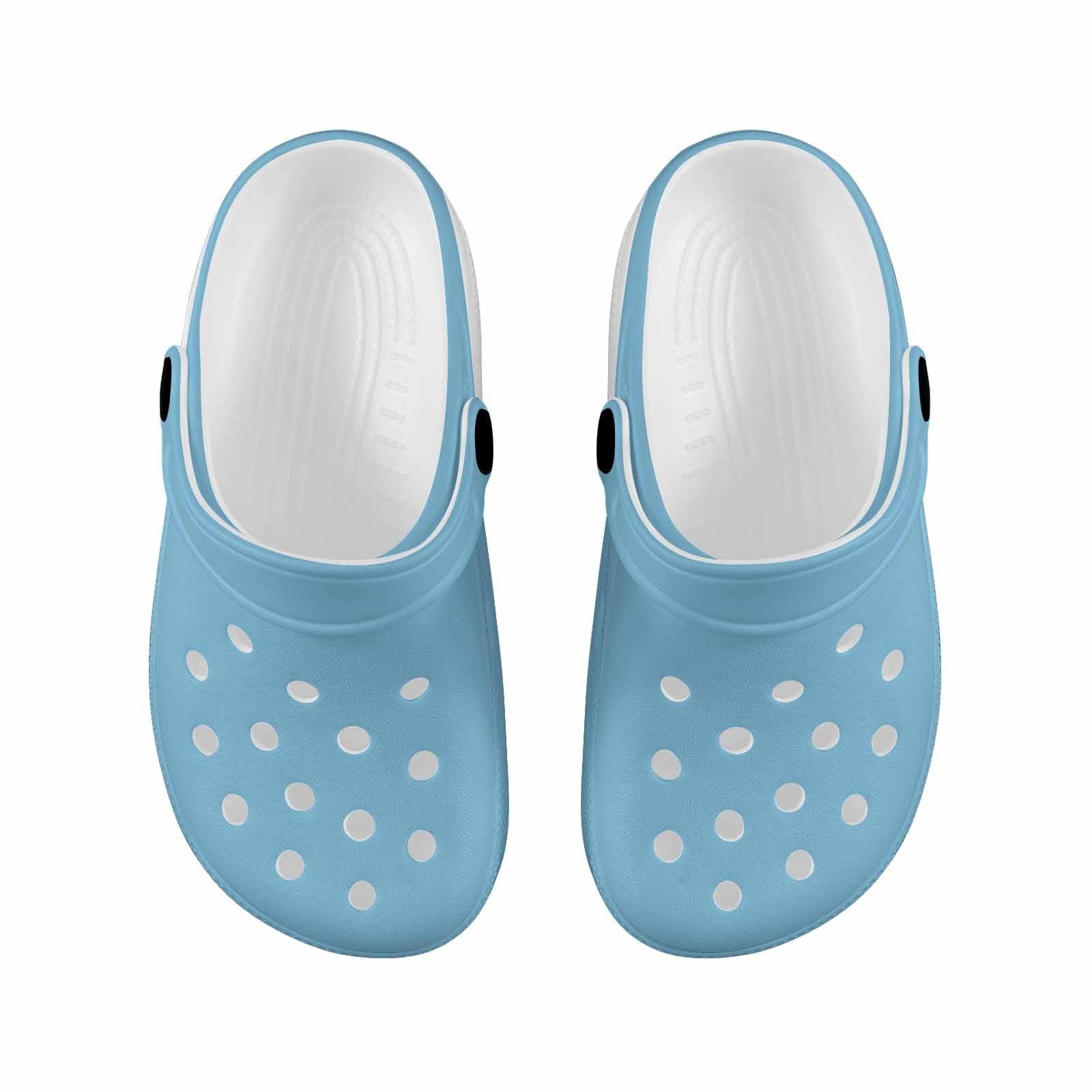 A pair of Baby Blue Clogs for Youth, featuring a lightweight design, breathable material, and cushioned sole, perfect for active kids.