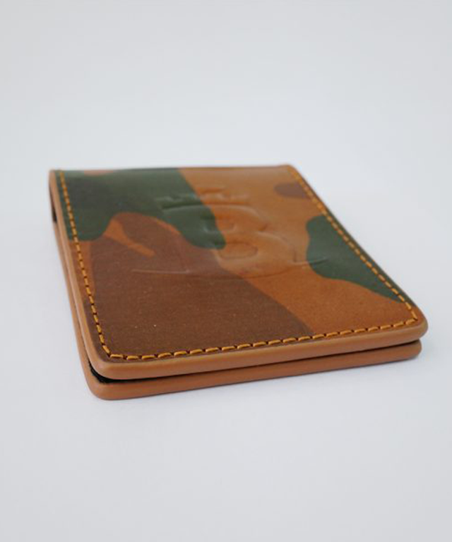 Baron Camouflage Money Clip in Brown, featuring a sleek design and powerful magnet for secure cash holding.