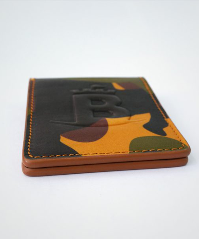 Baron Camouflage Money Clip in Yellow, featuring a sleek design and powerful magnet for secure cash and card storage.