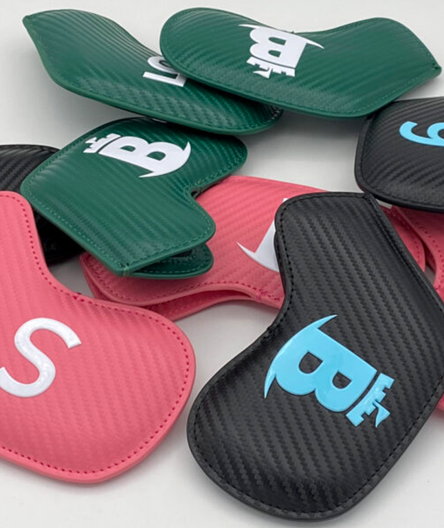 Baron Meraki Edition Iron Headcover in mixed colors: black, green, and pink, showcasing its stylish design and durable synthetic leather material.