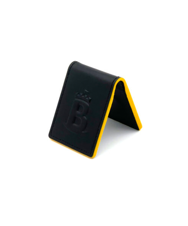 Baron Money Clip in yellow, made of natural cowhide with a sleek design and strong magnets, perfect for holding cash securely.