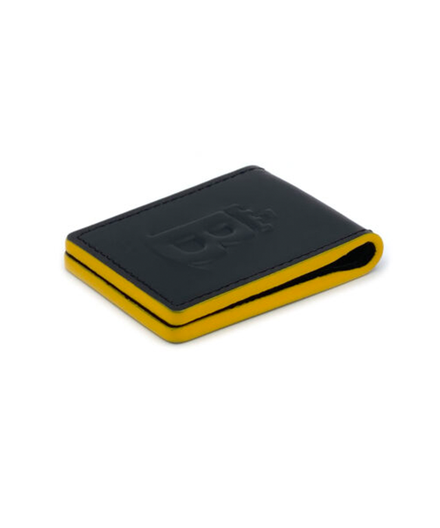 Baron Money Clip in yellow, made of natural cowhide with a sleek design and strong magnets, perfect for holding cash securely.