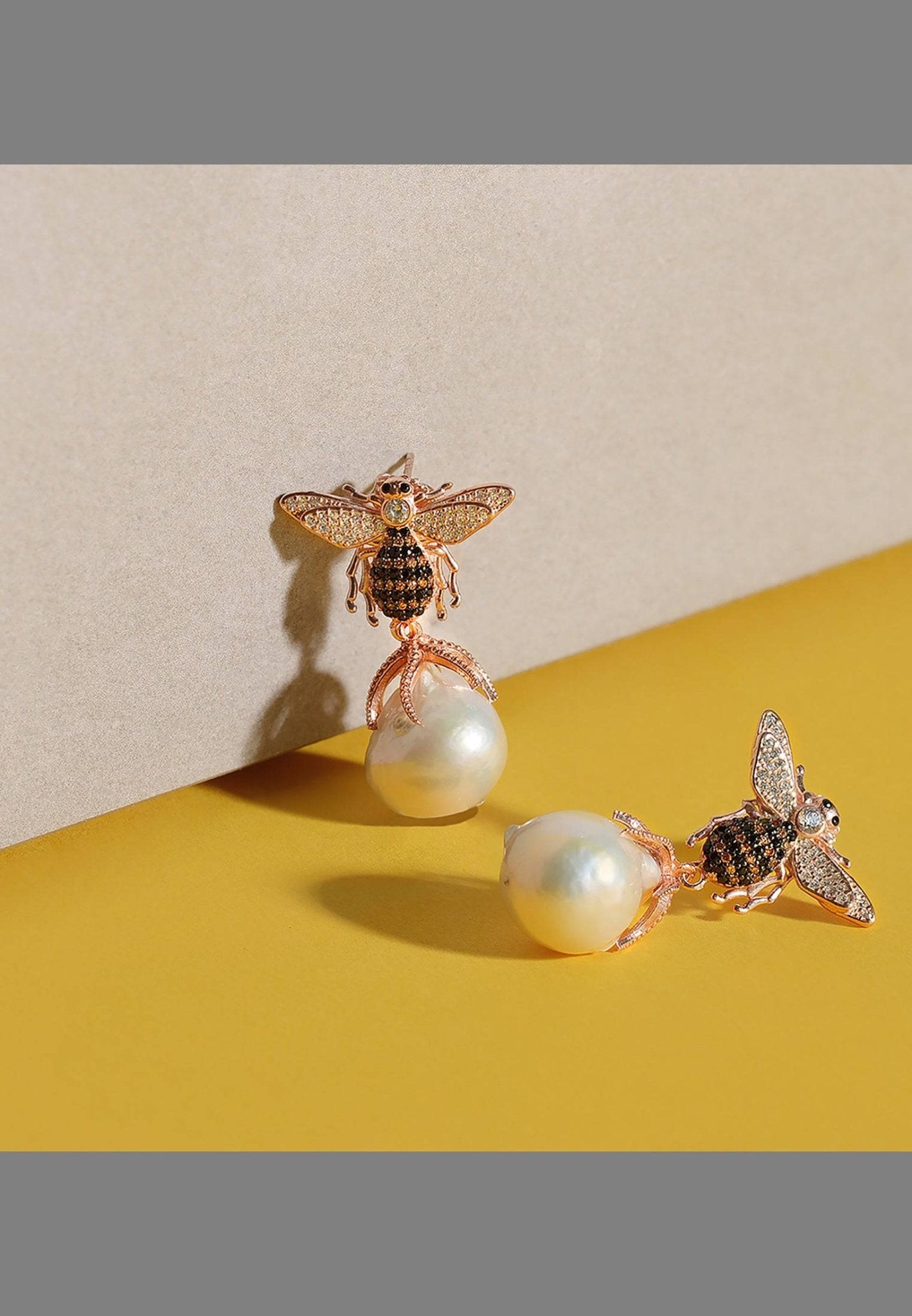 Baroque Pearl Honey Bee Drop Earrings in gold with cubic zirconia and natural baroque pearls, showcasing a unique bee design.