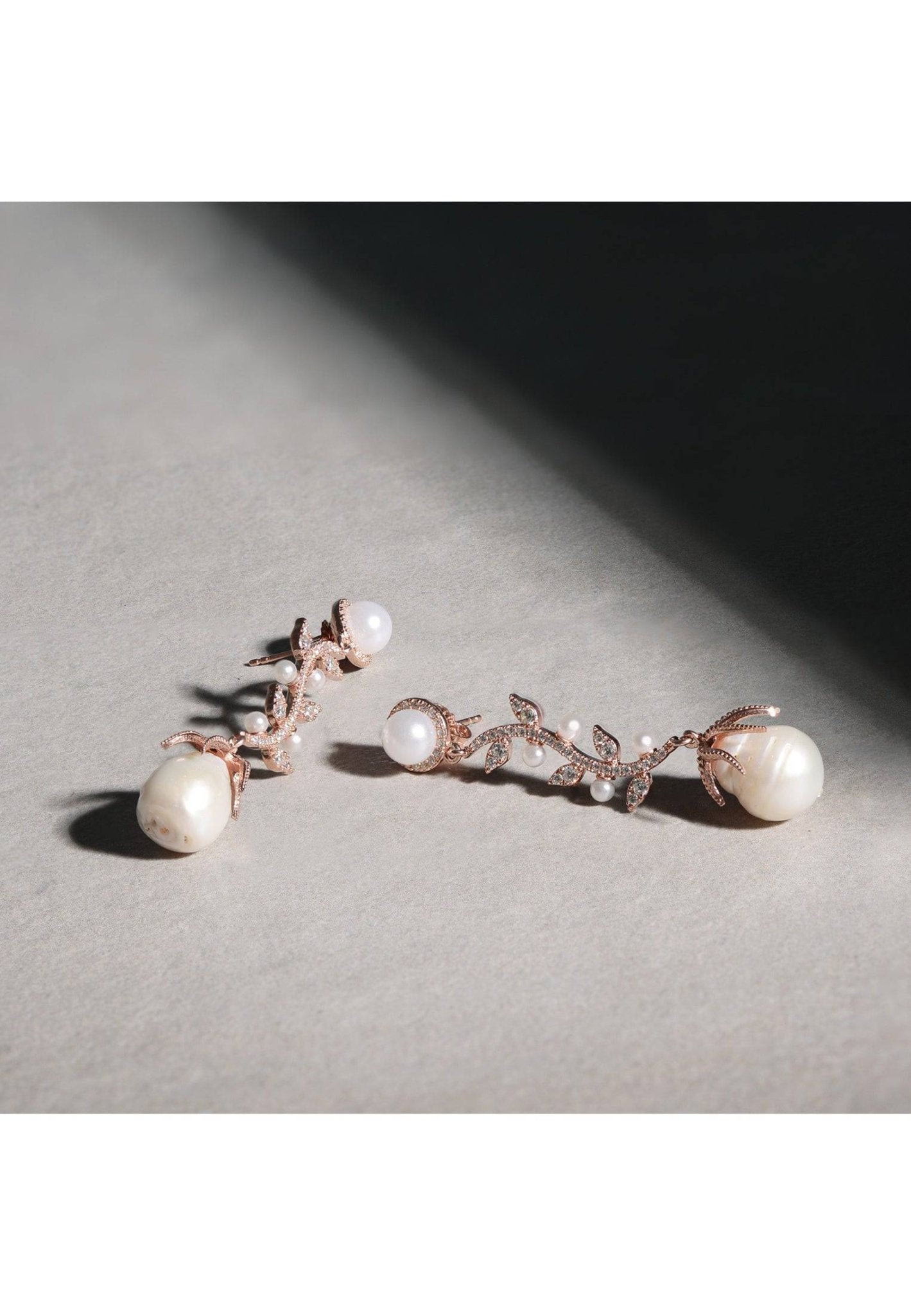 Baroque Pearl Trailing Flowers Earrings in Silver featuring unique baroque pearls and sparkling cubic zirconia stones, elegantly designed for any occasion.