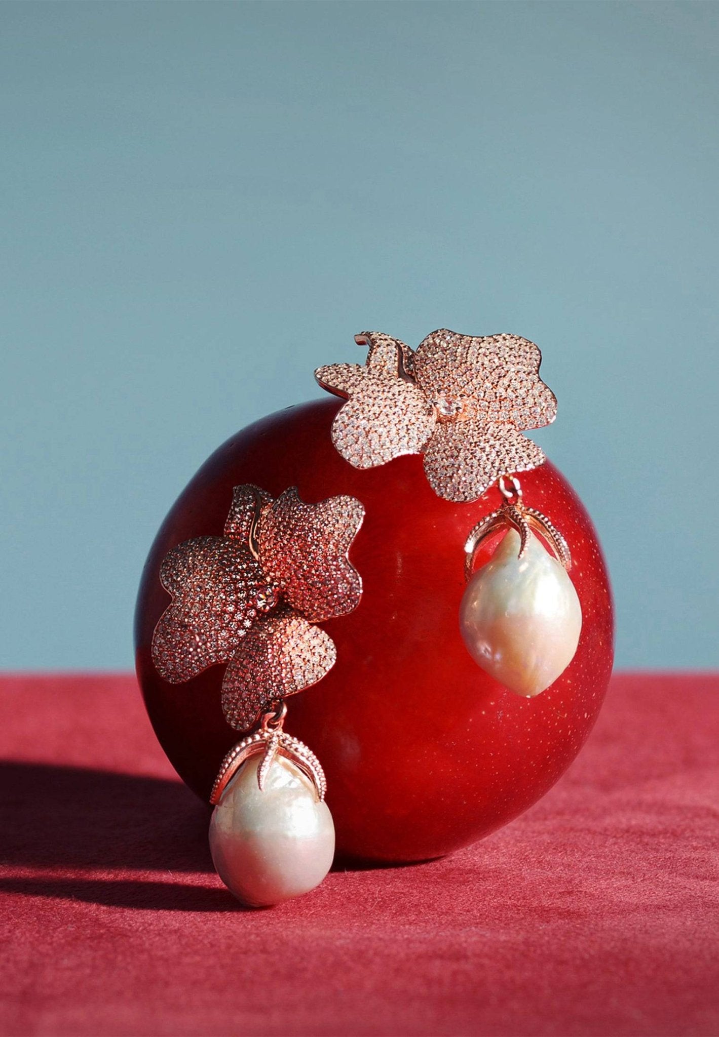 Baroque Pearl White Flower Drop Earrings in silver featuring floral tops and hanging baroque pearls.