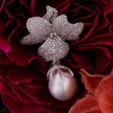 Baroque Pearl White Flower Drop Earrings in silver featuring floral tops and hanging baroque pearls.