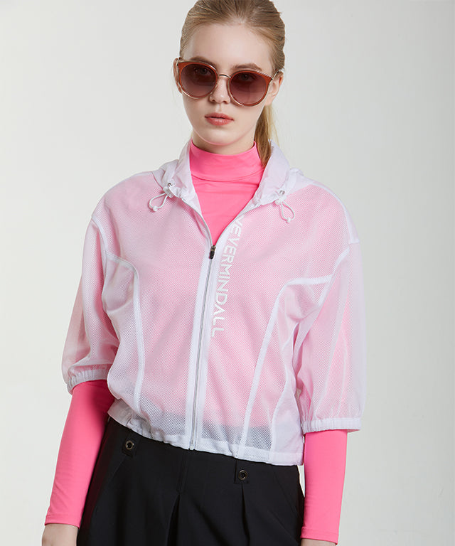 Basel Mesh Blouson in White featuring feminine shoulder ruffles and breathable mesh design.