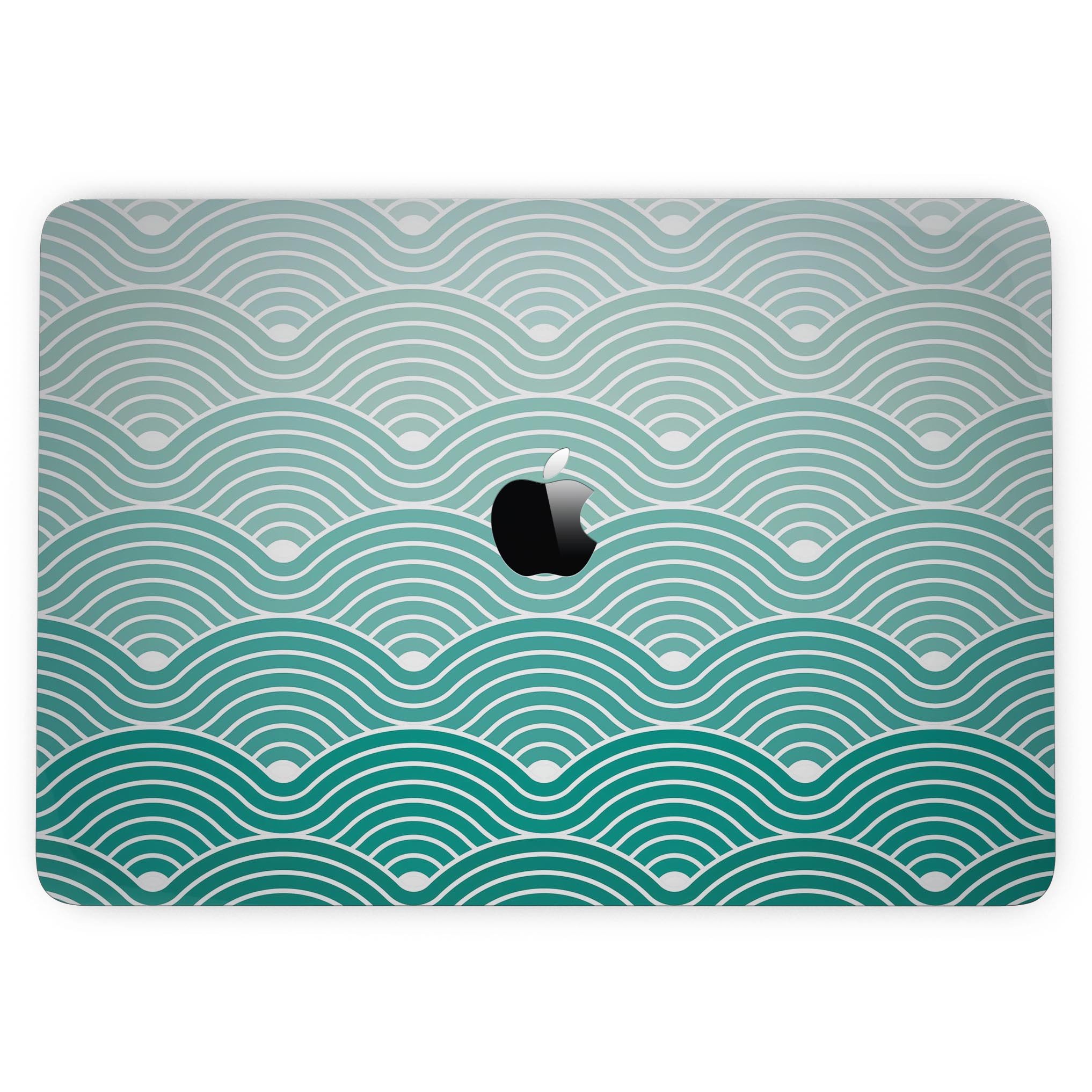 Beach Hotel Wallpaper Waves skin kit for MacBook Pro, showcasing vibrant ocean waves design on a sleek vinyl surface.