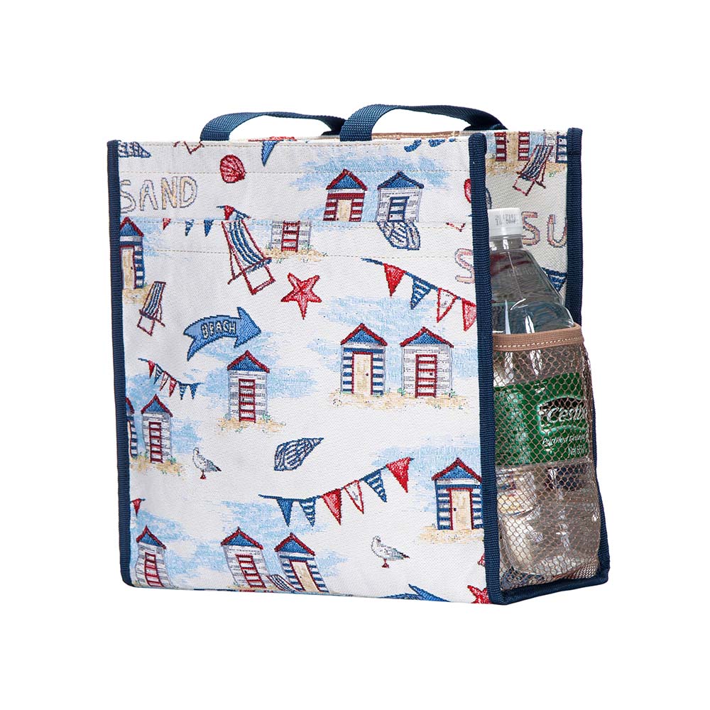 Beach Hut Shopper Bag made from eco dyed yarn, featuring zip and velcro pockets, patterned nylon lining, and sturdy handles.