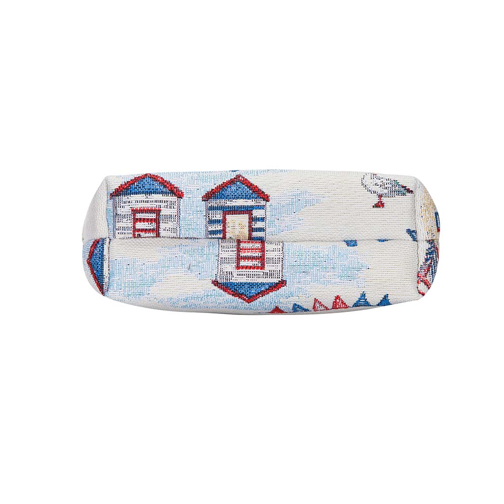 Beach Hut Sling Bag featuring a charming seaside design with sun loungers and seashells, made from eco-friendly materials.