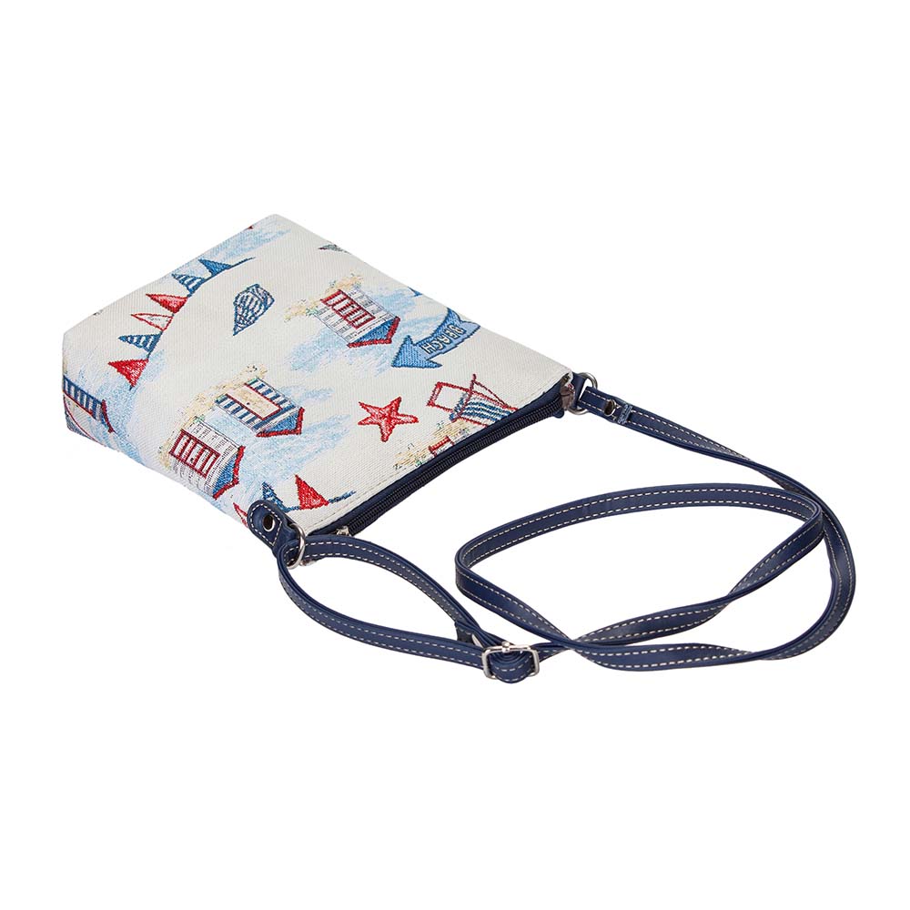 Beach Hut Sling Bag featuring a charming seaside design with sun loungers and seashells, made from eco-friendly materials.