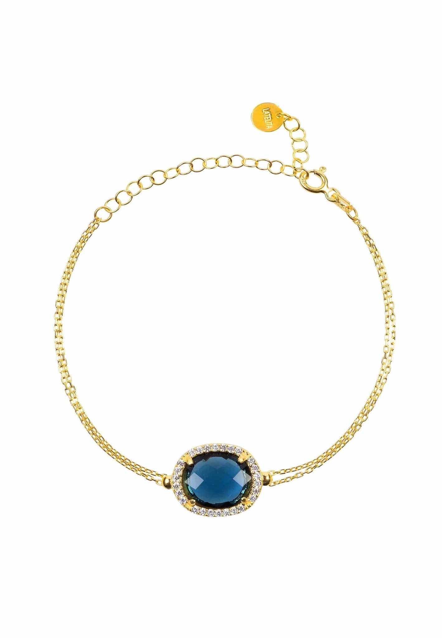 Beatrice Oval Gemstone Bracelet featuring a hydro sapphire and cubic zirconia details, elegantly crafted in gold-dipped sterling silver.