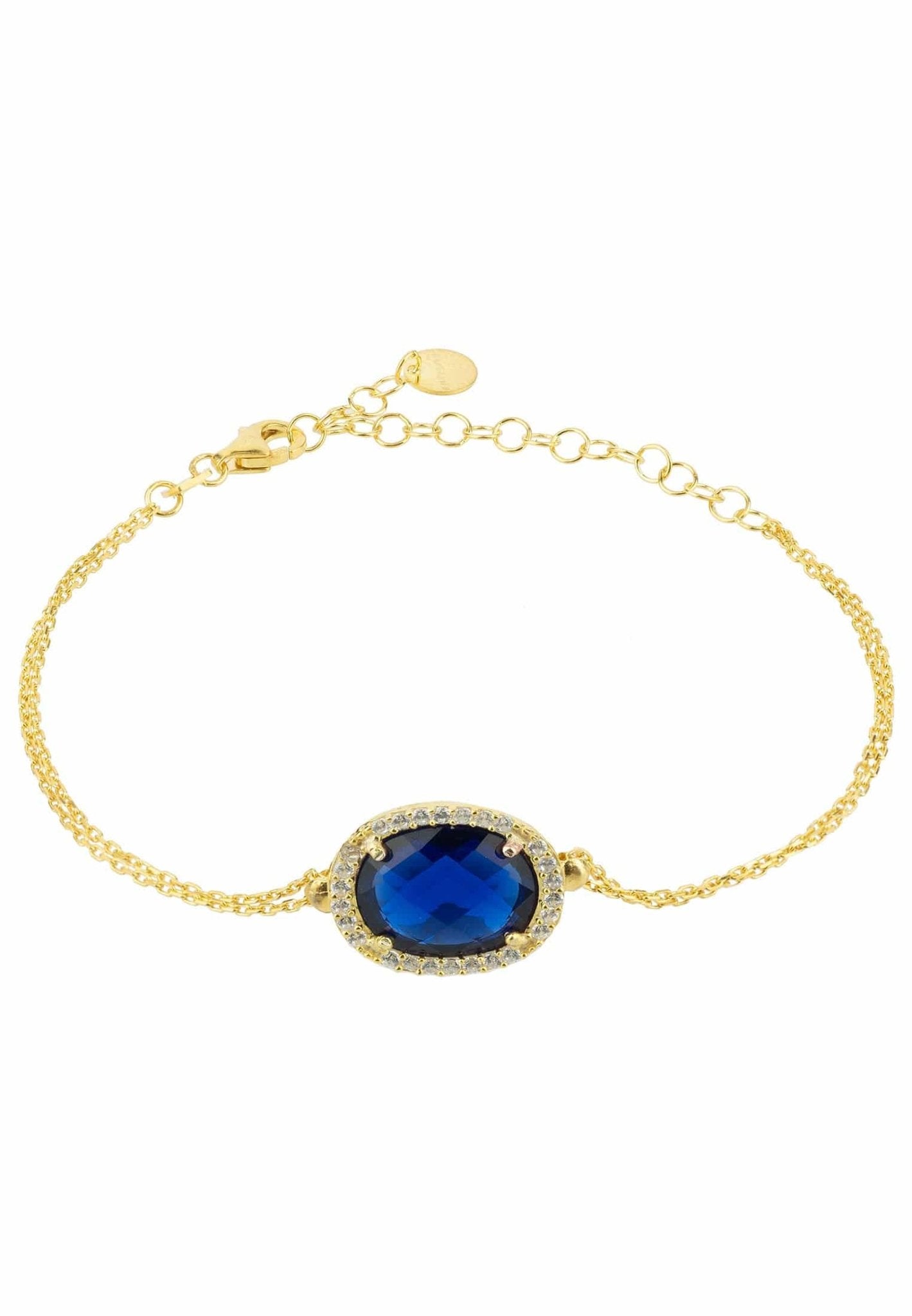 Beatrice Oval Gemstone Bracelet featuring a hydro sapphire and cubic zirconia details, elegantly crafted in gold-dipped sterling silver.