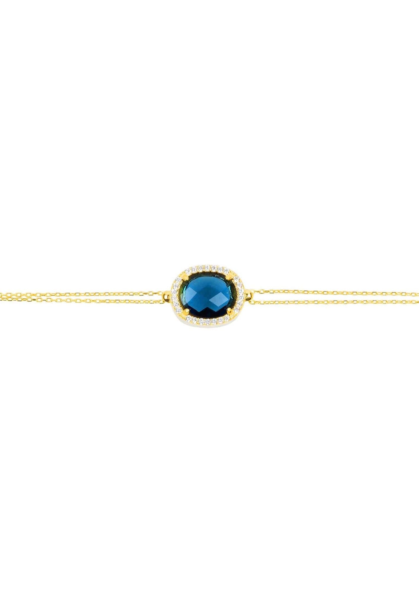 Beatrice Oval Gemstone Bracelet featuring a hydro sapphire and cubic zirconia details, elegantly crafted in gold-dipped sterling silver.