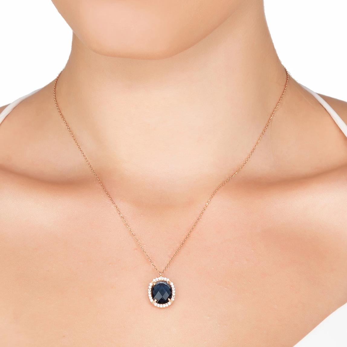 Beatrice Oval Gemstone Pendant Necklace in rose gold featuring a sapphire hydro centerpiece and cubic zirconia detailing.