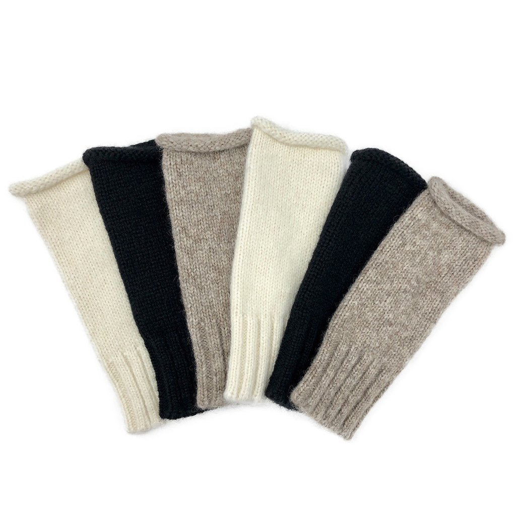 Beige Essential Knit Alpaca Gloves showcasing fingerless design and ribbed cuff, handmade in Peru from luxurious alpaca fiber.