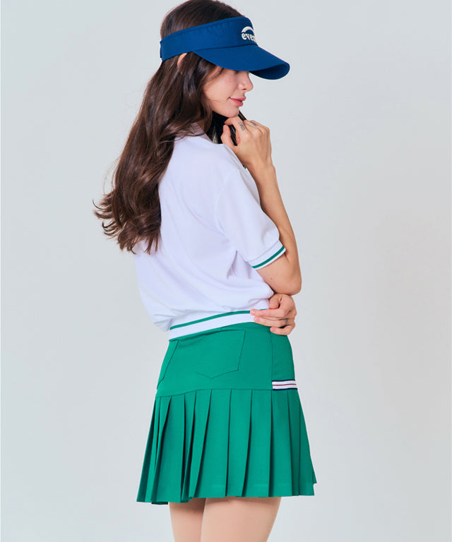 BENECIA 12 Asymmetric Culottes in Green, showcasing unique design and fabric texture.