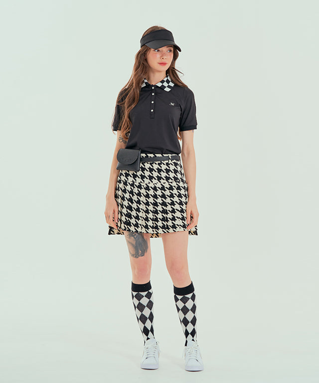 BENECIA 12 Big Hound Check Skirt featuring a pleated design and functional shorts, perfect for spring and fall.