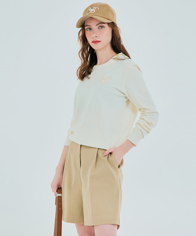 BENECIA 12 Butter Bermuda Shorts in Beige, showcasing relaxed fit and soft fabric.