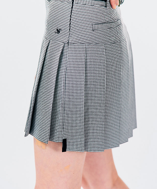 BENECIA 12 Unbalanced Check Skirt in Black, showcasing its unique design and fabric texture.