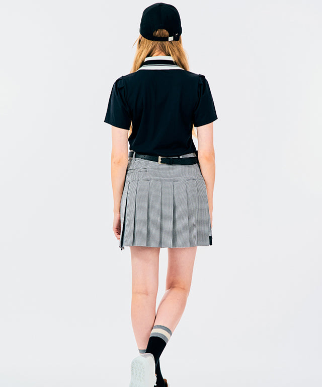 BENECIA 12 Unbalanced Check Skirt in Black, showcasing its unique design and fabric texture.