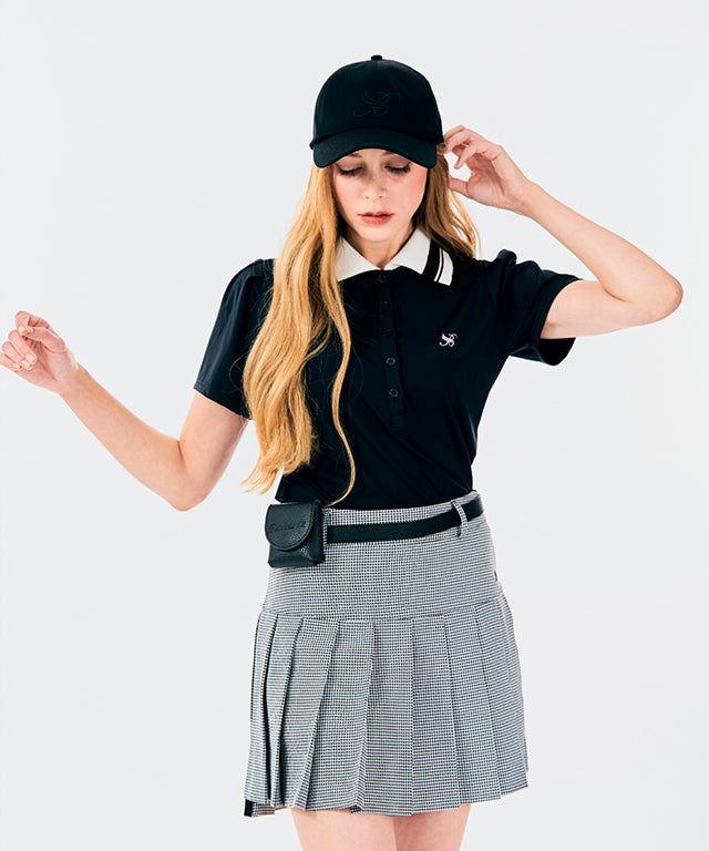 BENECIA 12 Unbalanced Check Skirt in Black, showcasing its unique design and fabric texture.