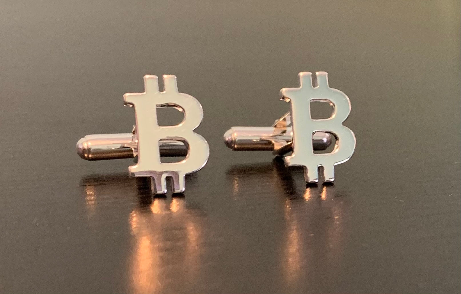 Stylish Bitcoin cufflinks made of 925 sterling silver, featuring a modern design that symbolizes cryptocurrency.