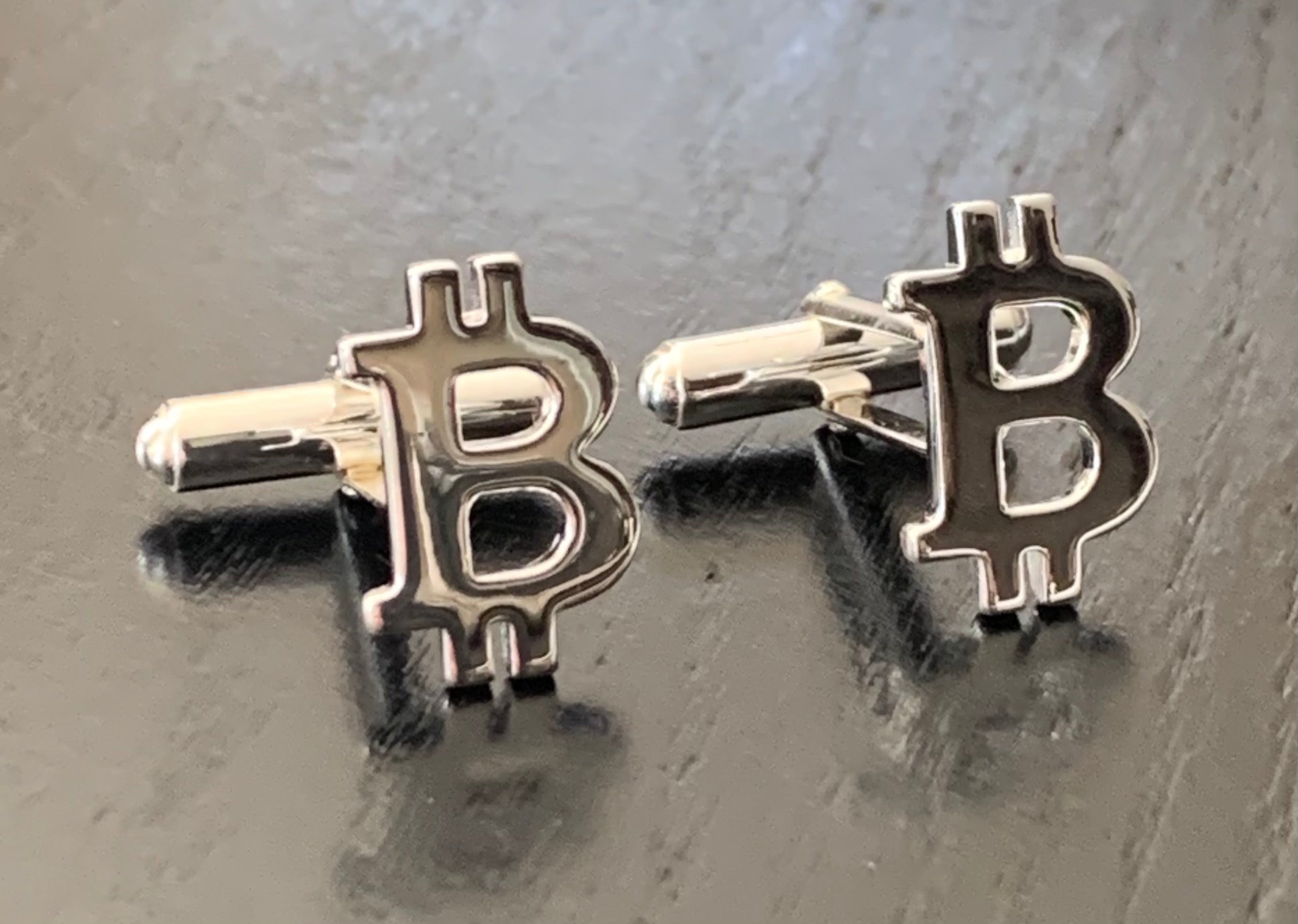 Stylish Bitcoin cufflinks made of 925 sterling silver, featuring a modern design that symbolizes cryptocurrency.