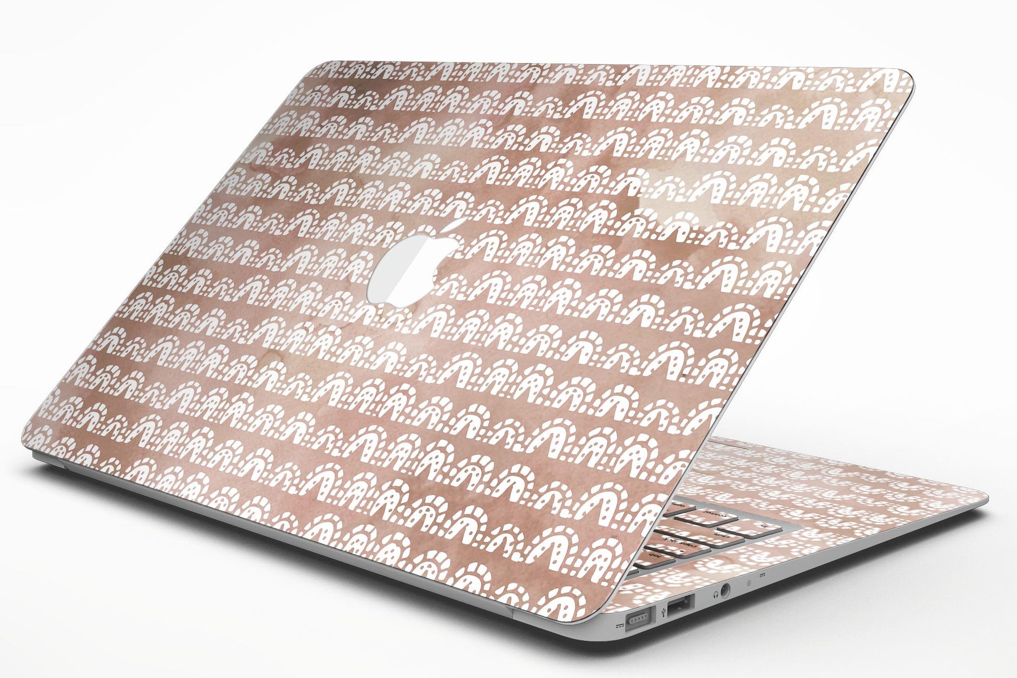 Black and brown grunge vinyl skin for MacBook Air with white semi-circles, showcasing a stylish design.