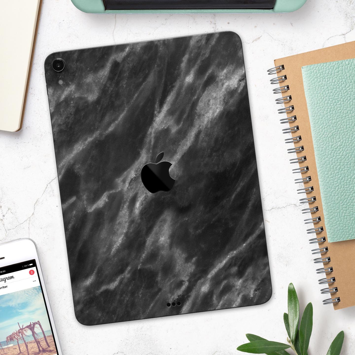 Black and Chalky White Marble skin decal for Apple devices, showcasing a stylish and protective design.