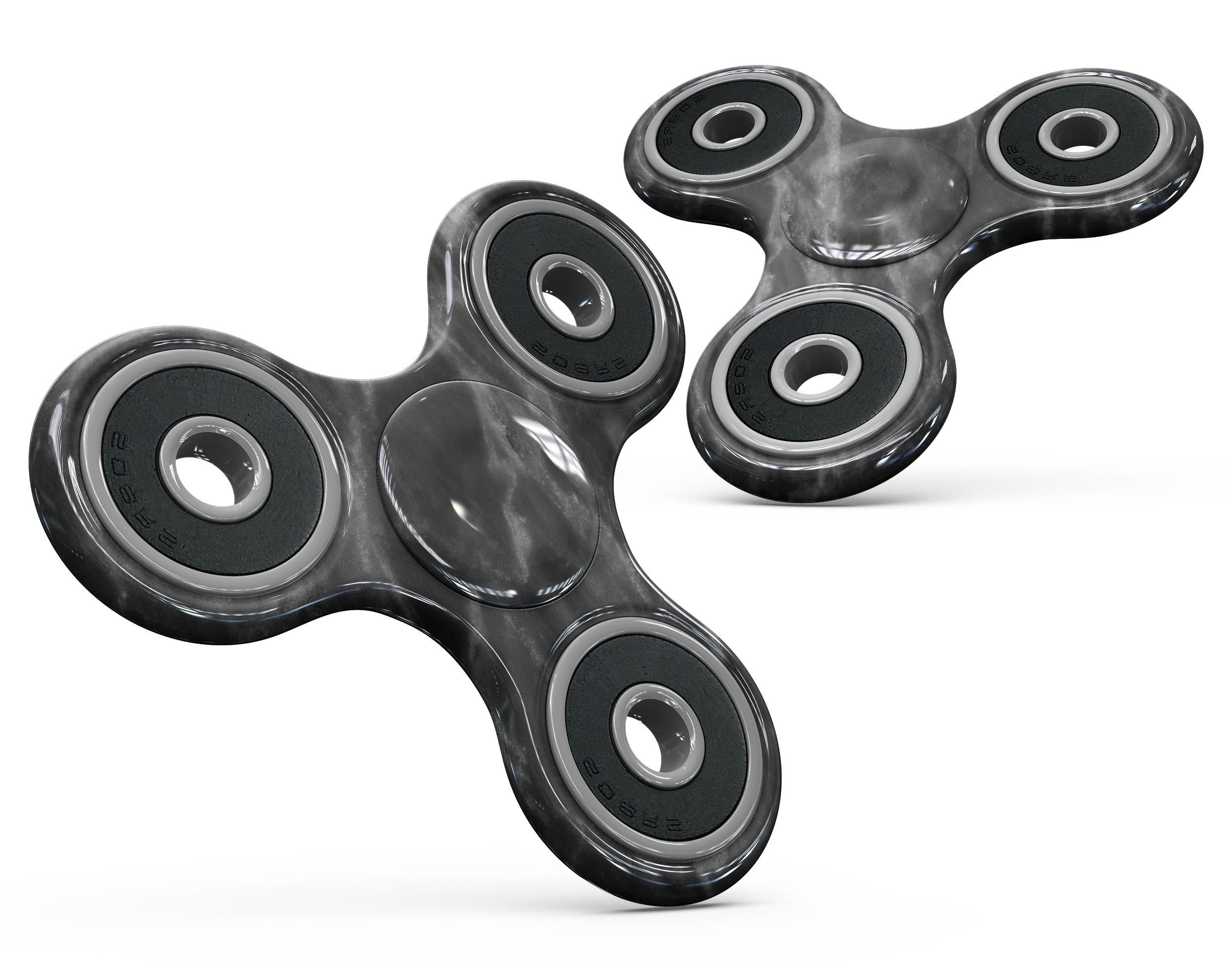 Black and chalky white marble skin kit for fidget spinner, showcasing a stylish design that protects the device.