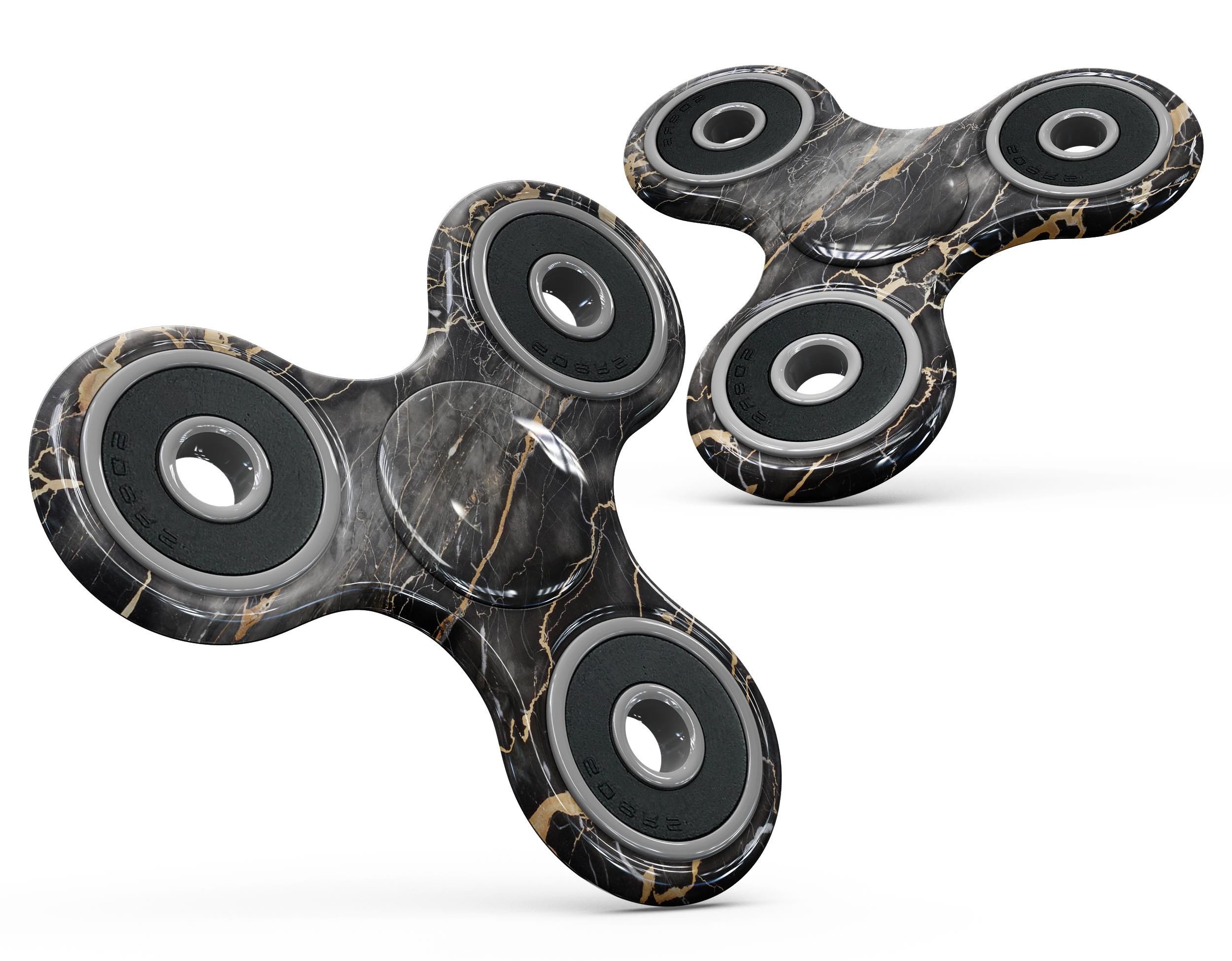 Black and gold marble surface skin kit for fidget spinner, showcasing a stylish design that fits perfectly on the device.