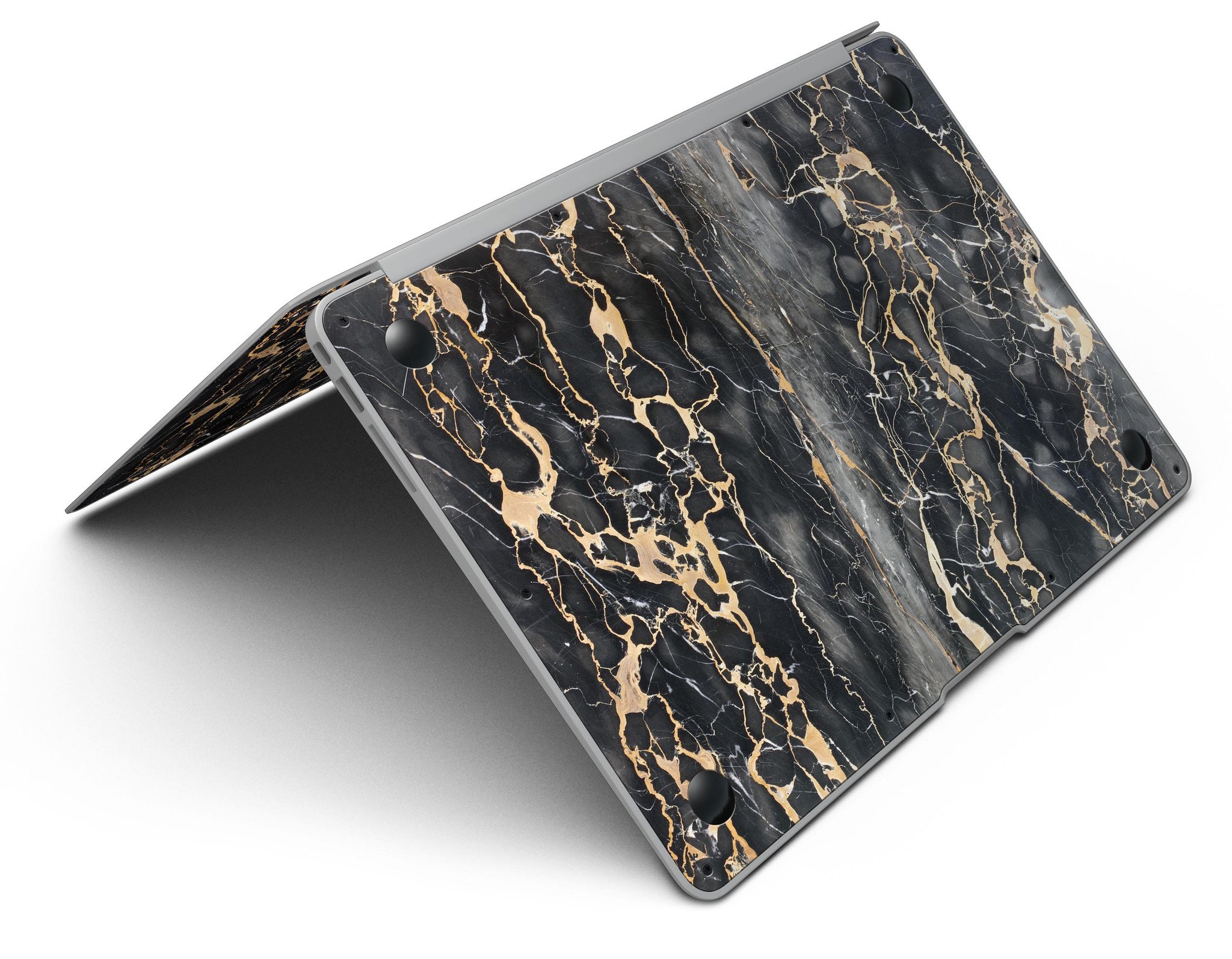 Black and Gold Marble Surface Skin Kit for MacBook Air, showcasing a stylish design with a premium vinyl finish.