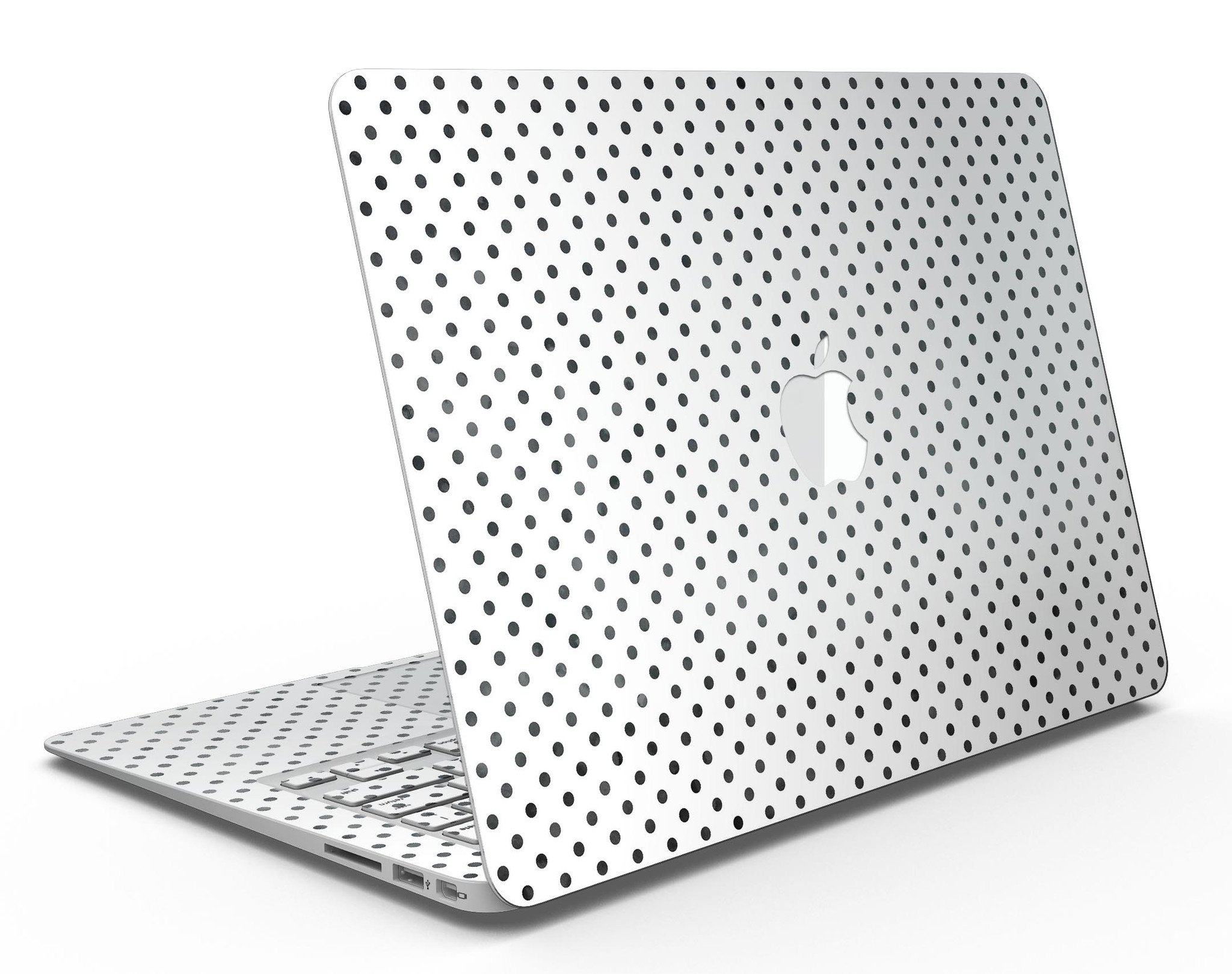 Black and gray fade polka dots skin kit for MacBook Air, showcasing a stylish design that protects the device from scratches.