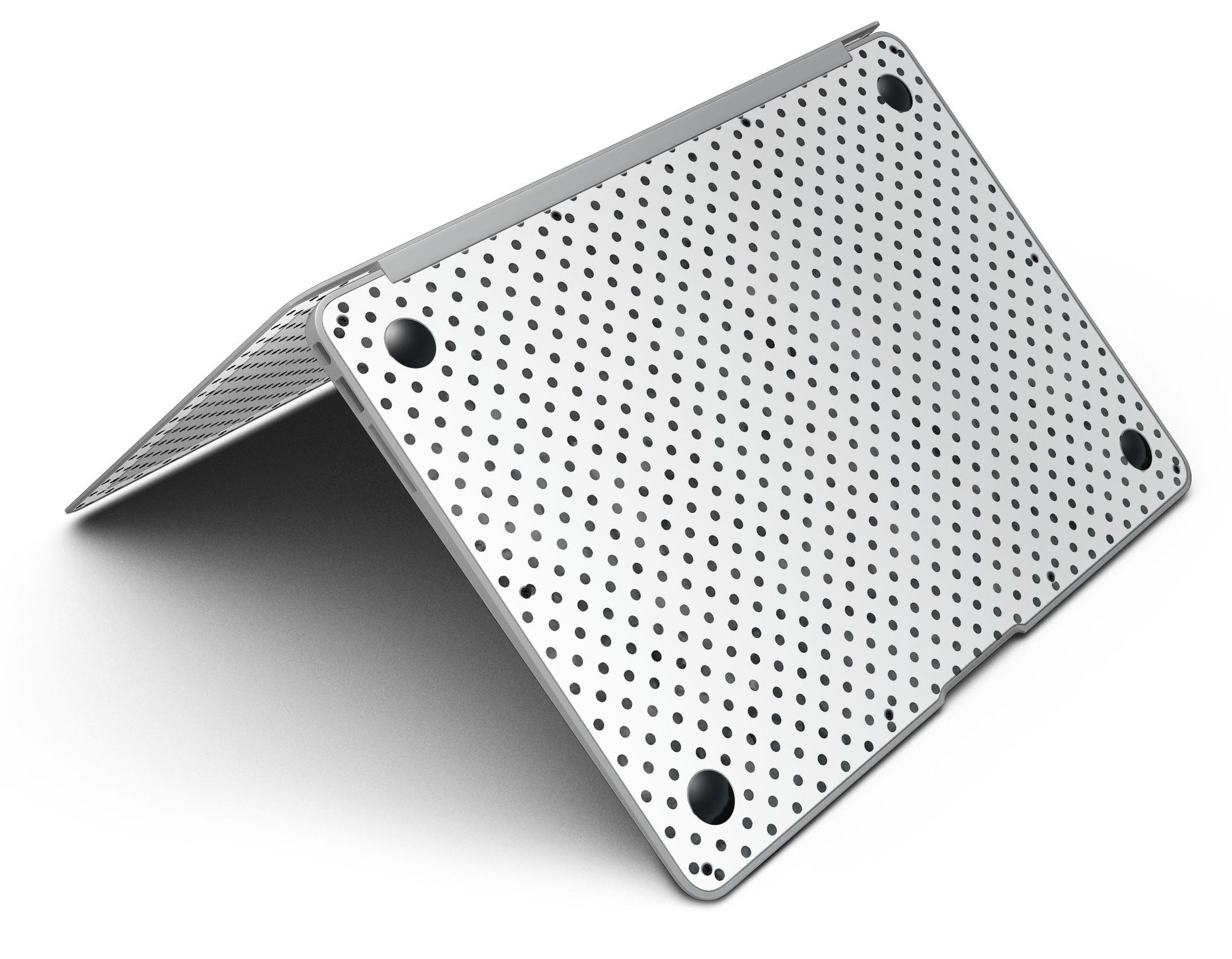 Black and gray fade polka dots skin kit for MacBook Air, showcasing a stylish design that protects the device from scratches.